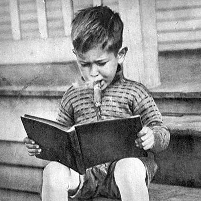 kid-smoking-and-reading